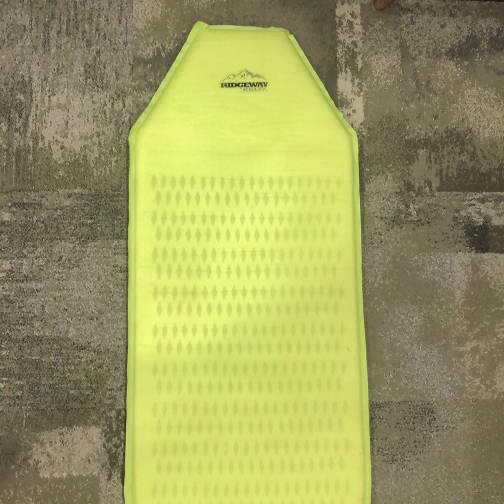 Self inflating camping sleep pad